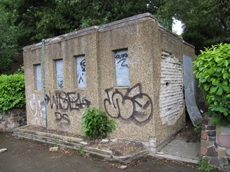 closed down and derelict concrete public toilet block in London