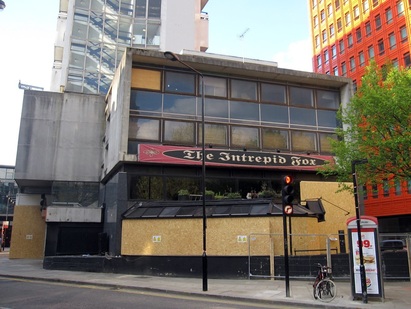 The closed down Intrepid Fox rock pub on St Giles Street behind Centrepoint soon to be demolished to make way for redevelopment as Crossrail drives up property values