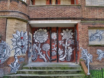 Streetart on boarded up derelict housing estate in East London