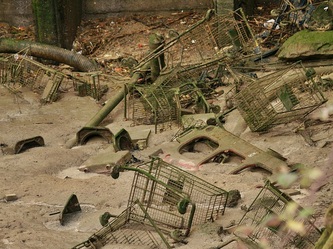 dumped supermarket trolleys on the Thames foreshore in Charlton, South London