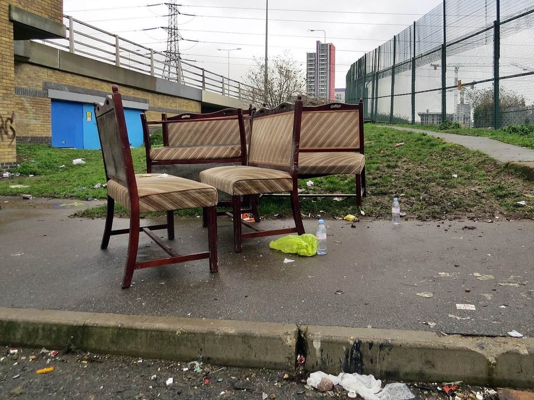 dumped chairs beside the road in London borough of Newham