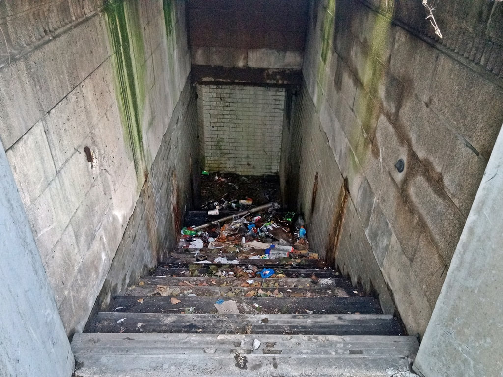 Derelict stairwell down to subterranean public toilets in Archway, North London