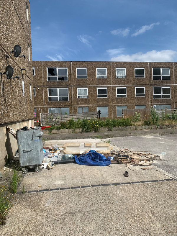 Broken windows on empty housing estate in Woolwich, South London