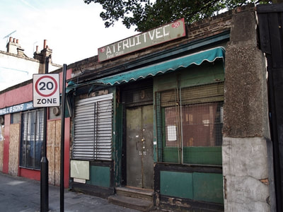 Closed down fruit and veg shop in Stepney, East London