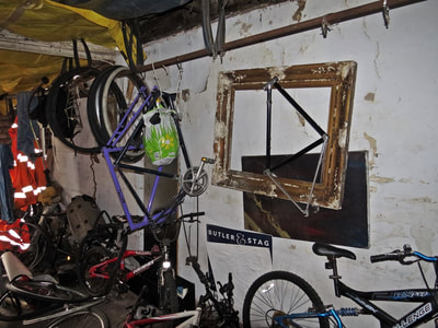 Abandoned bike workshop in derelict shop on Commercial Road, E14