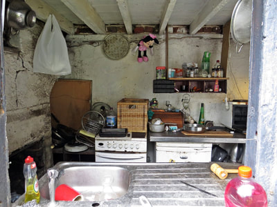 kitchen in abandoned closed down shop in Limehouse on the A13