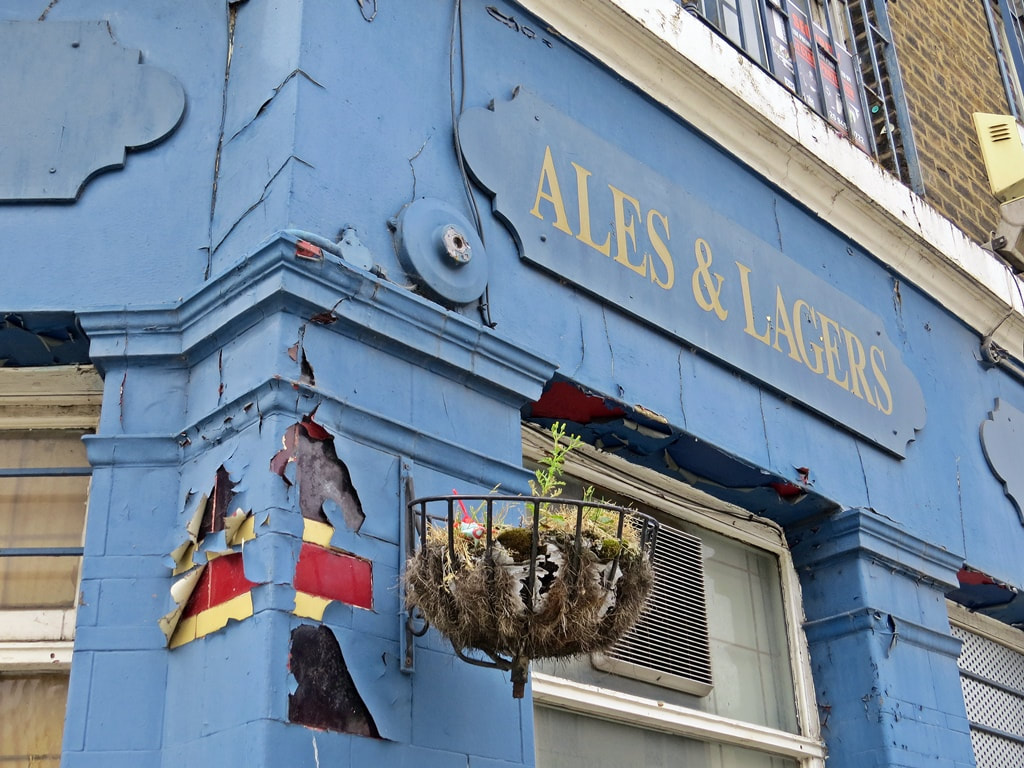 Ales and lagers sign on closed down derelict pub Lord Palmerston Deptford