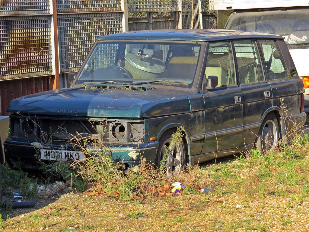 Redundant Range Rover in yard in East London 