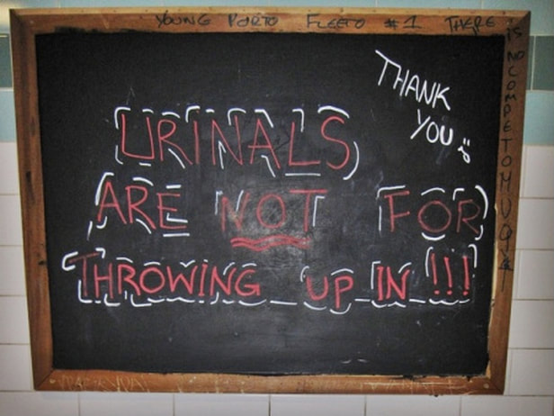 urinals are not for throwing up in!!! Wandsworth pub toilet