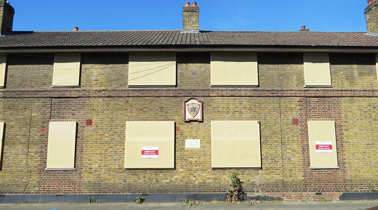 Picture of vacant properties - the boarded up Church Army Housing on  Horsley Street and Queen's Row