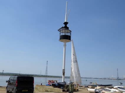 image of The restored light mast of The Gull in the Thurrock Yacht Club on Grays Beach on the River Thames