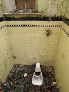 smashed up toilet in abandoned building in Purfleet, Essex