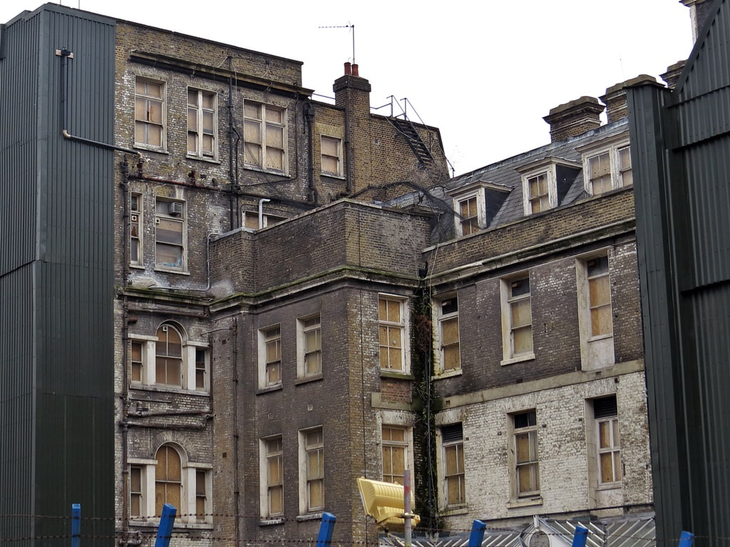 derelict old hospital buildings on Whitechapel High Street opposite Crossrail Elizabeth Line Station