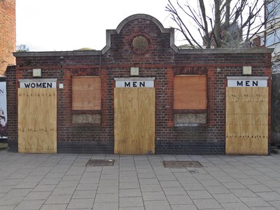 Boarded up closed down public toilets Tottenham High Road N17