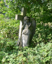 Angel headstone in the overgrown Woodgrange Cemetery near Manor Park