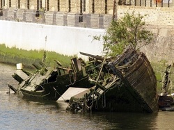 Picture Abandoned boat wreck on Barking Creek on River Roding East London