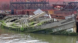 Picture derelict abandoned boat in Greenwich on the Thames in 2003