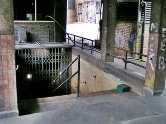  A stairway leading from the derelict station down to the Highgate Northern Line ticket hall. 