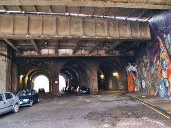 Dark and dingy railway arches between London Bridge and Deptford