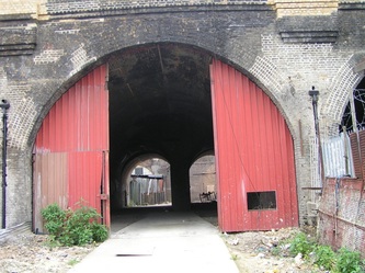 Vacant brick railway arches in South London