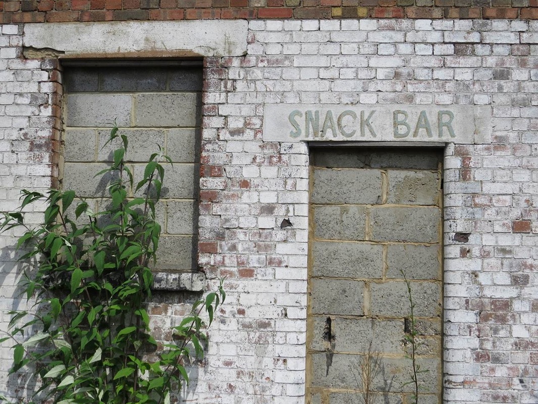 Picture derelict snack bar/cafe in industrial estate in Ailsa Rd, East London
