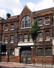 LIMEHOUSE E14 -  The abandoned Caird and Rayner building on Commercial Road