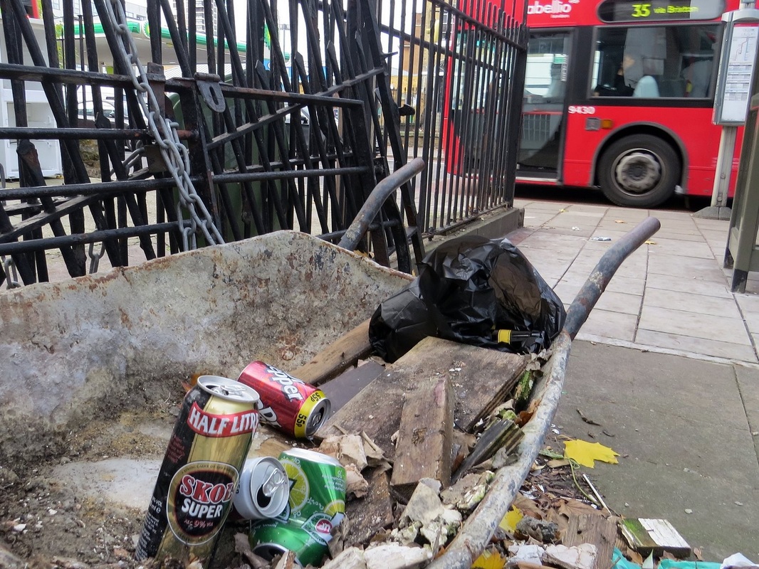 Camberwell abandoned wheelbarrow with booze cans
