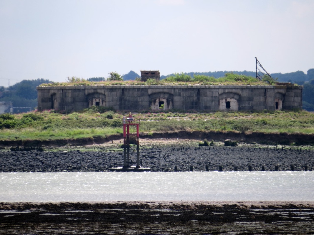 Picture of The derelict Hoo Fort on the Medway.Disarmed before the First World War. In the Second World War, the fort was used as observation posts, with platforms and pillboxes built on top.