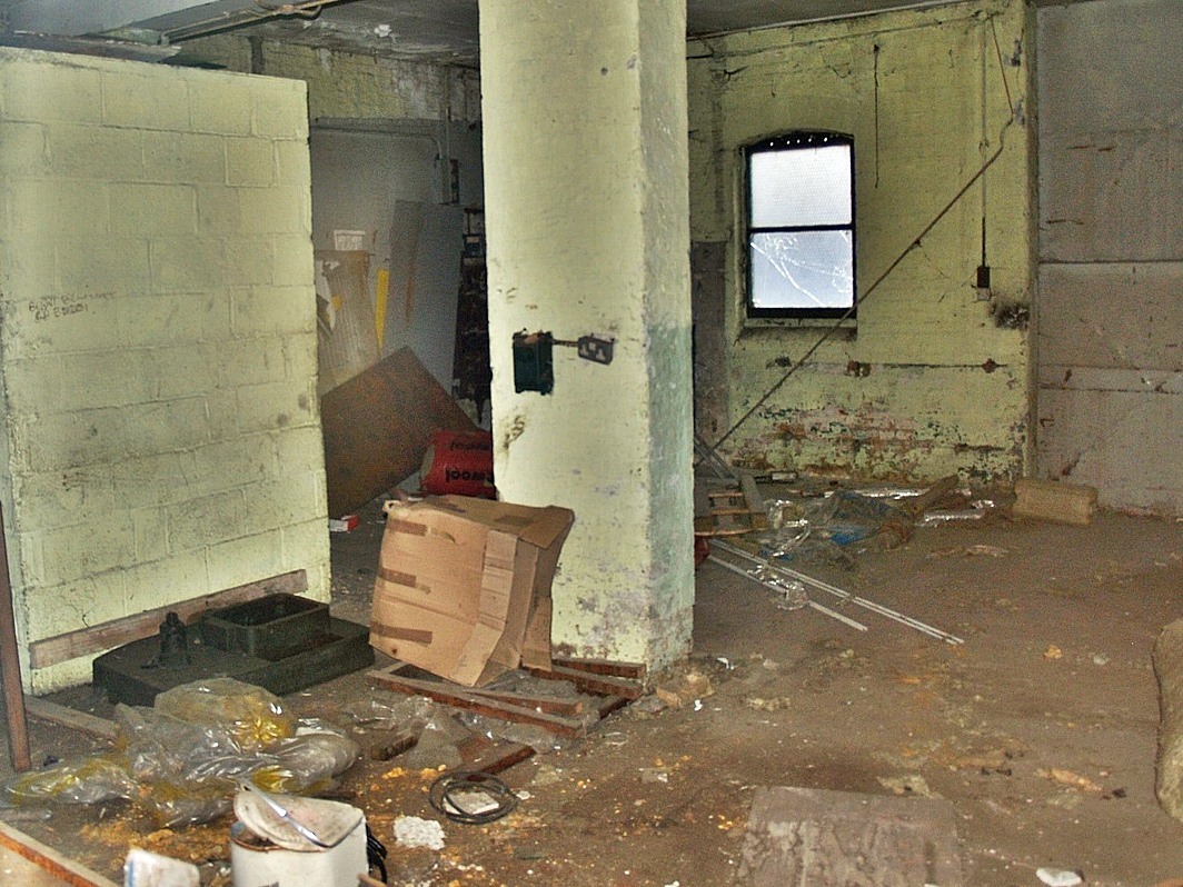 Derelict interior of abandoned warehouse in Cuba St, London E14