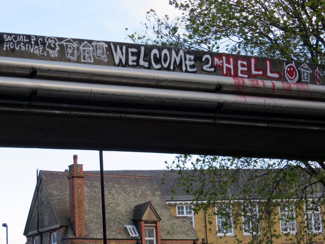 Welcome to Hell graffiti on derelict walkway in Walworth South London