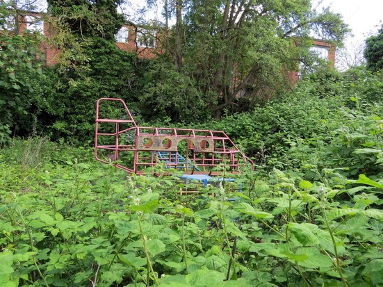 The abandoned Tyneholme Nursery & Headstone Centre, a pre school language centre In Harrow. The playground is overgrown and the buildings are in a derelict state