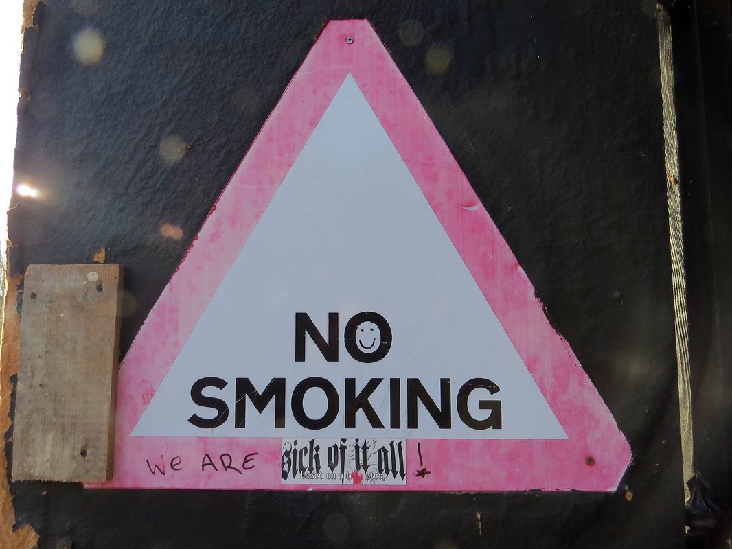 No Smoking. We are sick of it all warning sign and sticker for the band outside recording studio in  Muswell Hill, N10