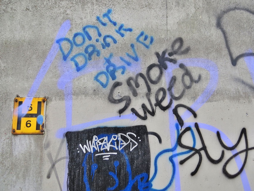 Graffiti in abandoned Heygate Estate in Walworth. Dont drink and drive smoke weed