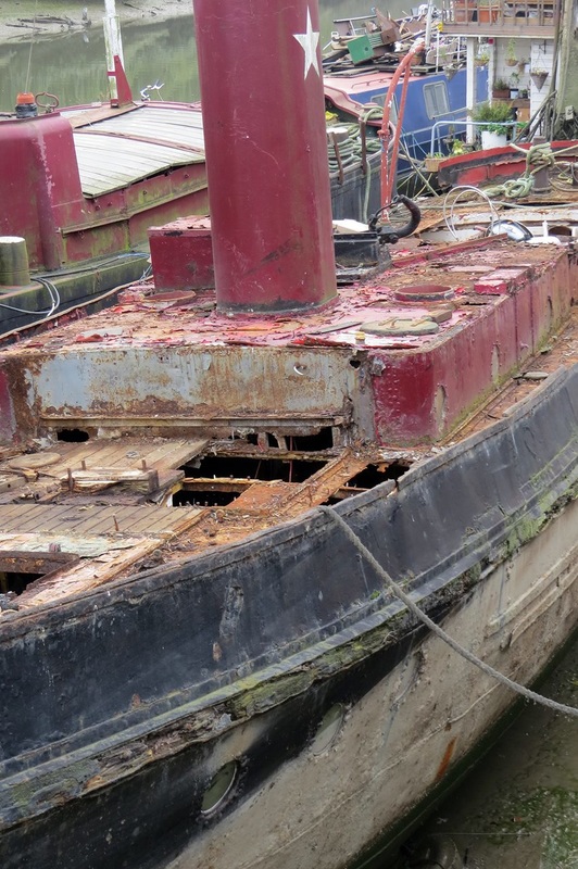 Picture of rusty decaying boat on the River Thames in Brentford Middlesex
