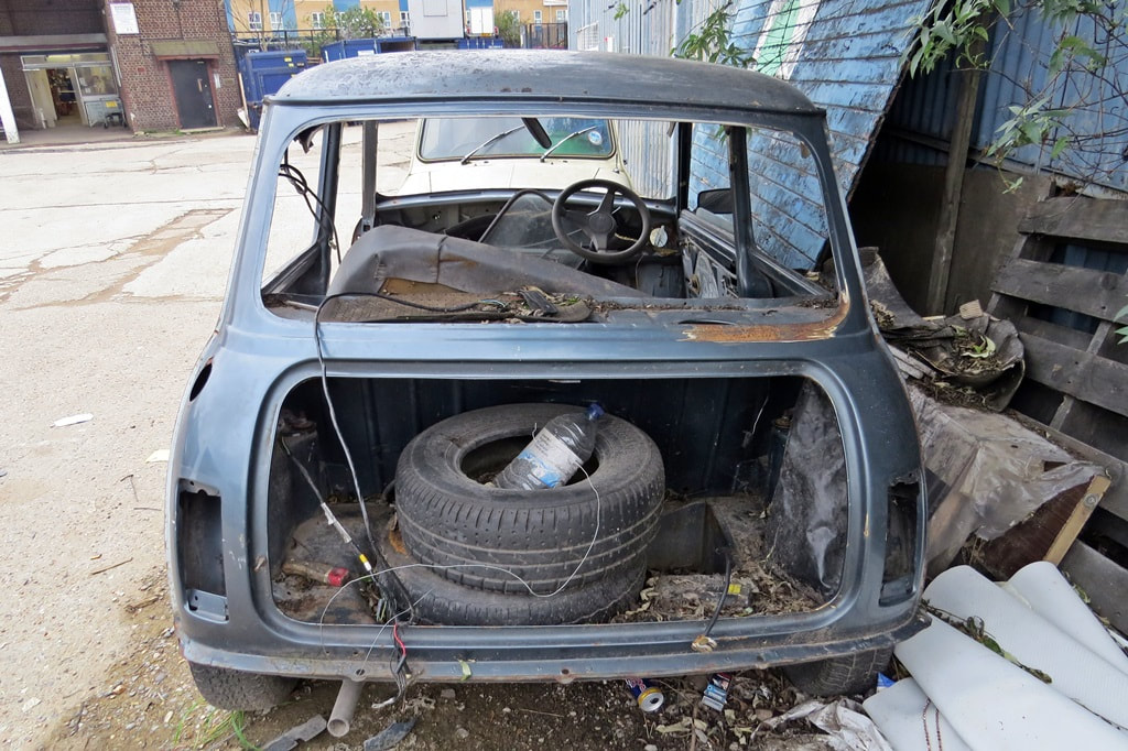Gutted shell of Austin Mini in East London