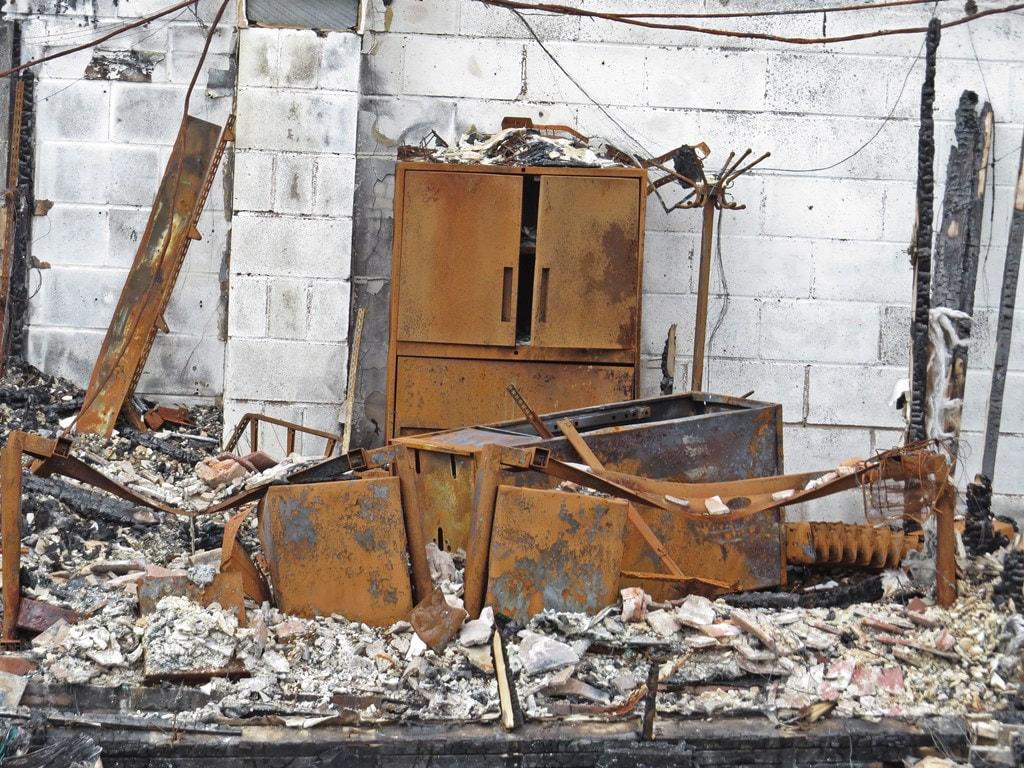 Burnt office furniture at ​Imperials Prestige Used Cars - Chadwell Heath,Romford. RM6
