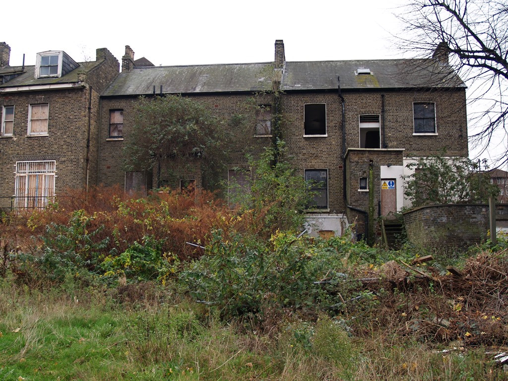 Rear of derelict house on Denmark Hill now renovated by the NHS Mawdsley Hospital 