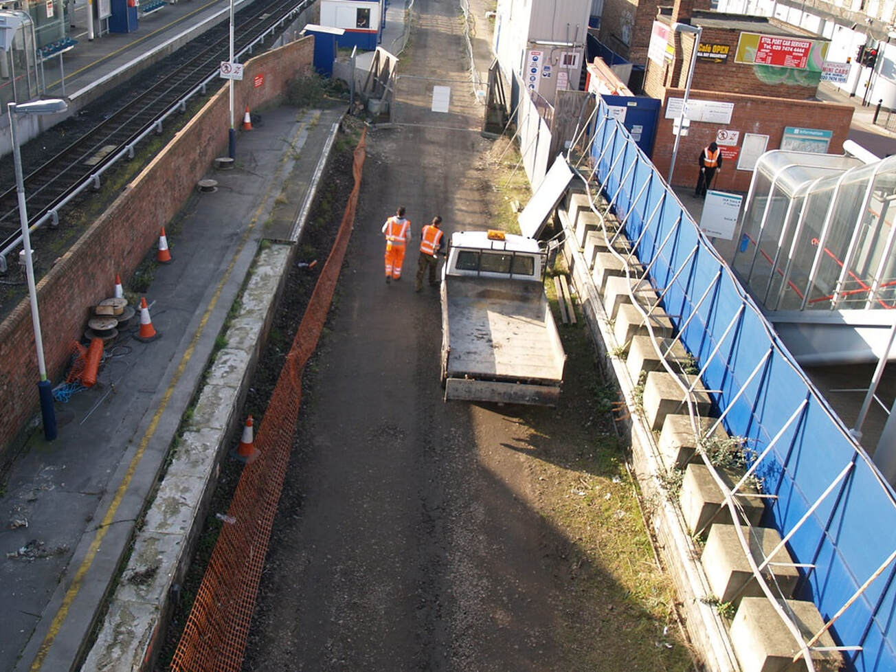 The former trackbed between the platforms of  Custom House Silverlink Station 