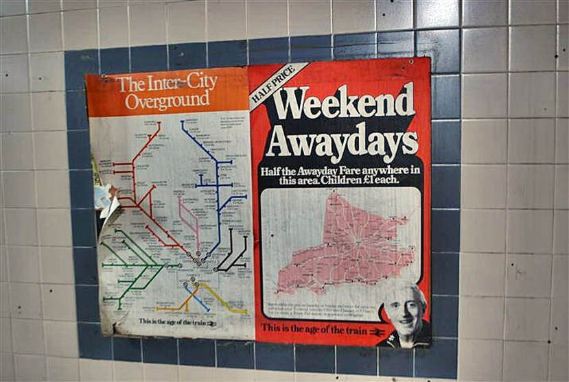 Poster with Jimmy Saville advertising weekend Awaydays on a disused London platform 