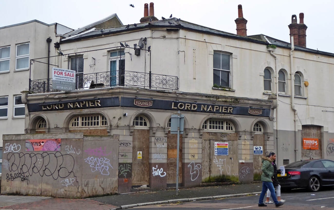 Picture of closed down and derelict boarded up  Lord Napier jazz club in Thornton Heath