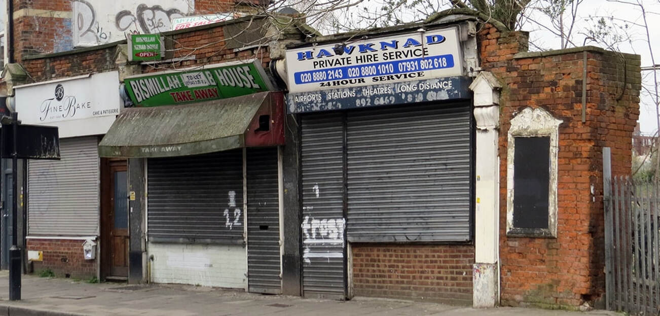 Picture of a row of shut down derelict shops in Stoke Newington 