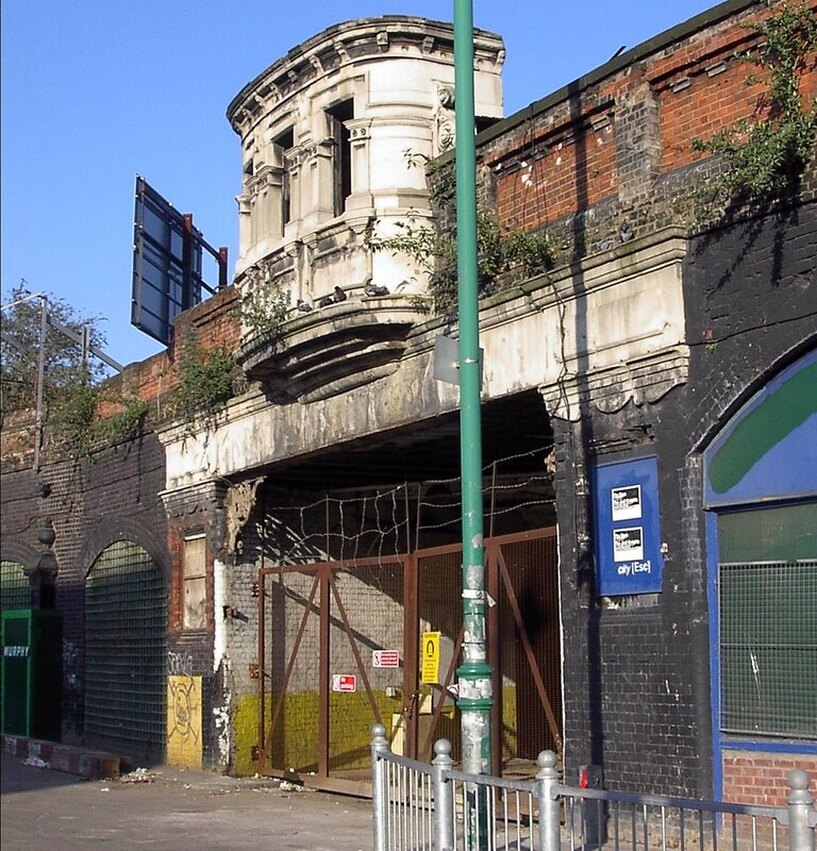 Derelict and overgrown Oriel Gate into the abandoned Bishopsgate Goodsyard in East London