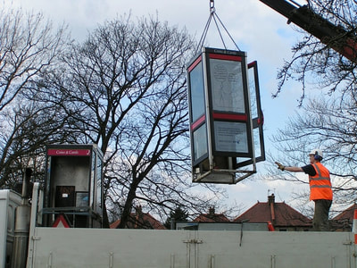Redundant BT phonebox being removed in North London