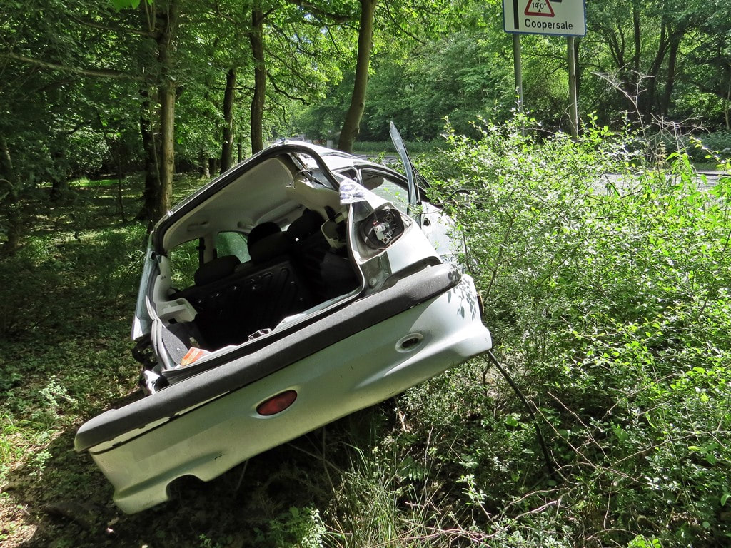 wrecked car abandoned in Epping Forest