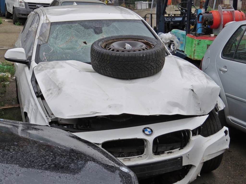 Redundant BMW in Peckham scrap yard