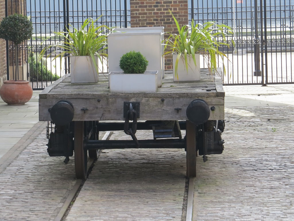 Repurposed rail waggon to hold plants at Free Trade Wharf in Shadwell, East London. 