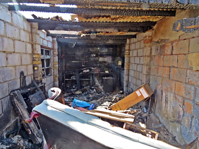 Burnt out garage in Grays, Essex