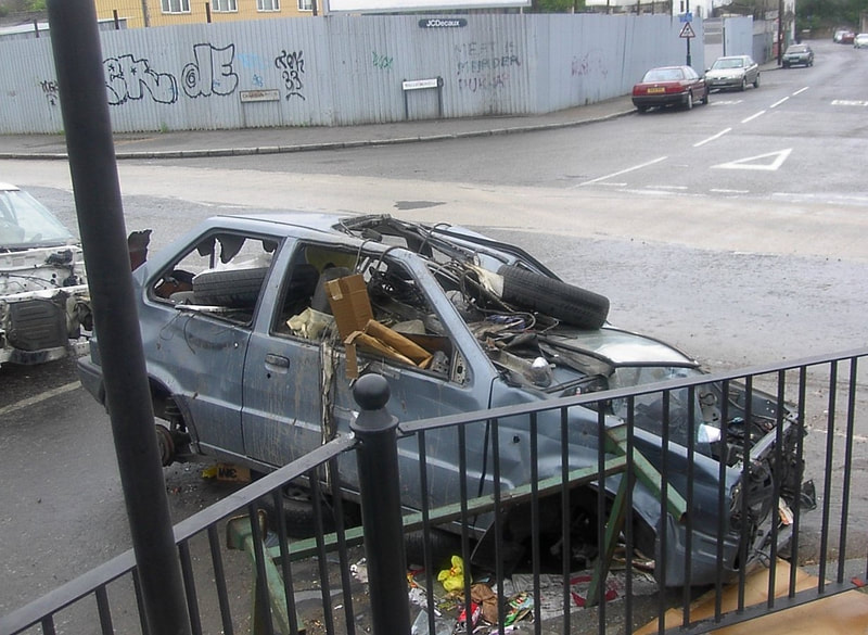 Abandoned wrecked car in East London
