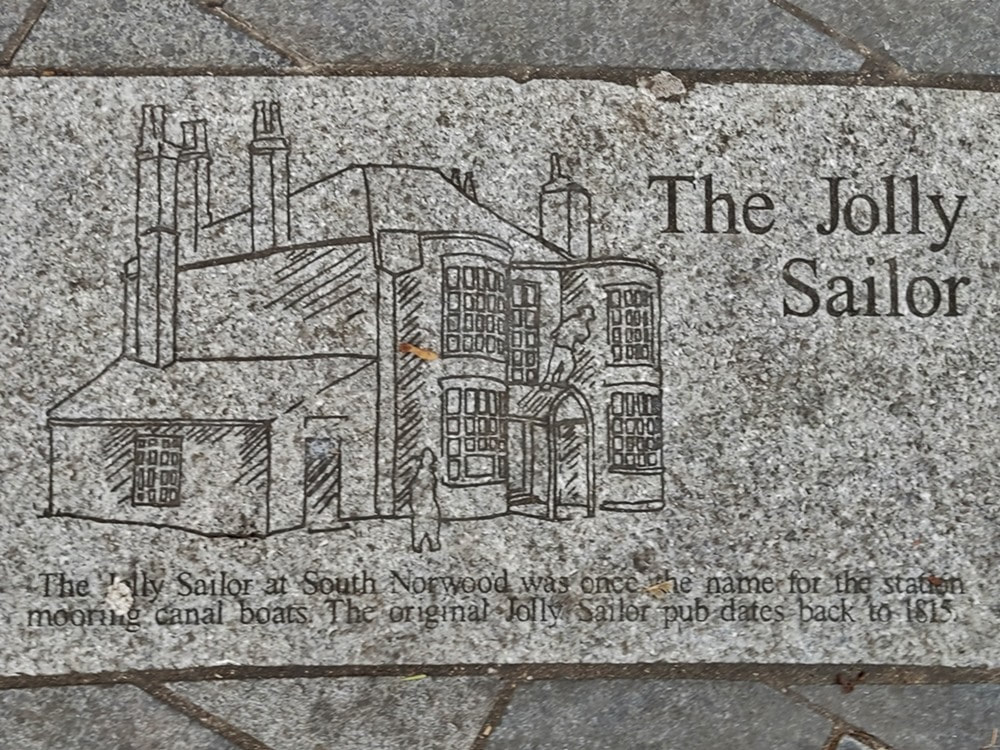 Plaque showing drawing of the original Jolly Sailor Inn beside the Croydon Canal in Norwood.