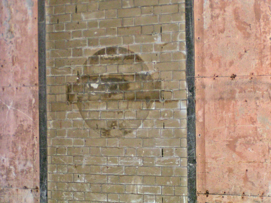 London Transport roundel evidence on wall of disused Kingsway tram tunnel in Holborn